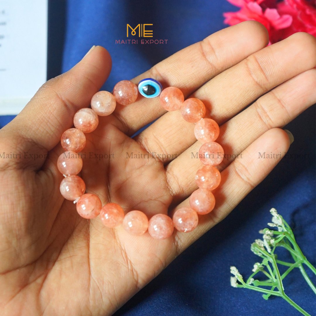 10mm Round beads Healing Crystals with Evil Eye Bracelet-Peach Moonstone-Maitri Export | Crystals Store