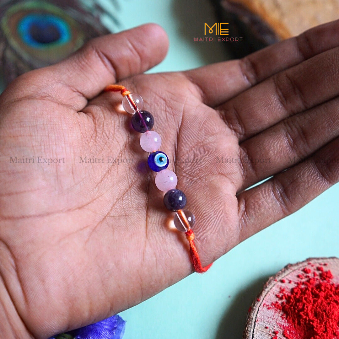 Natural crystal stone purposed rakhi-focus and peace-with evil eye bead-Maitri Export | Crystals Store