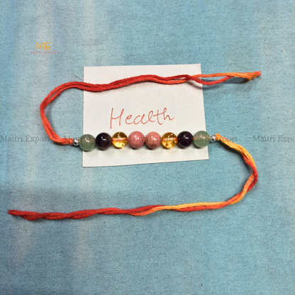 Natural crystal stone purposed rakhi-Maitri Export | Crystals Store