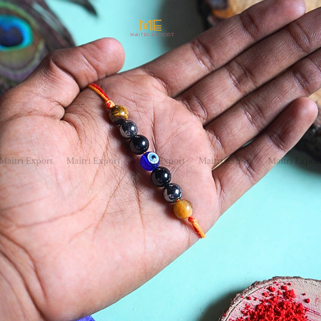 Natural crystal stone purposed rakhi-Triple protection-with evil eye bead-Maitri Export | Crystals Store