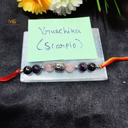 Natural crystal stone based zodiac sign rakhi-Scorpio-with buddha charm-Maitri Export | Crystals Store