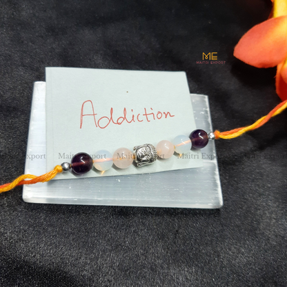 Natural crystal stone purposed rakhi-Addiction-with buddha charm-Maitri Export | Crystals Store