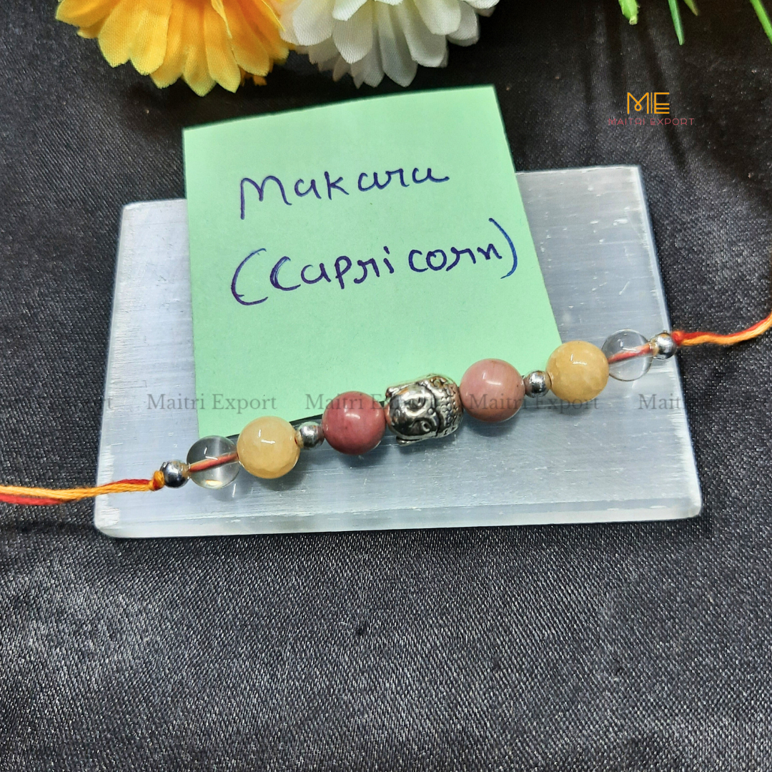 Natural crystal stone based zodiac sign rakhi-Capricorn-with buddha charm-Maitri Export | Crystals Store