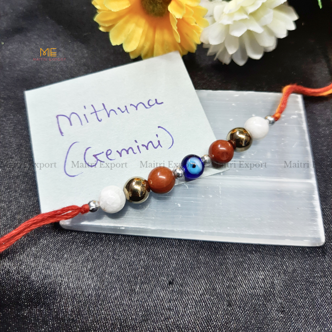 Natural crystal stone based zodiac sign rakhi-Gemini-with evil eye bead-Maitri Export | Crystals Store